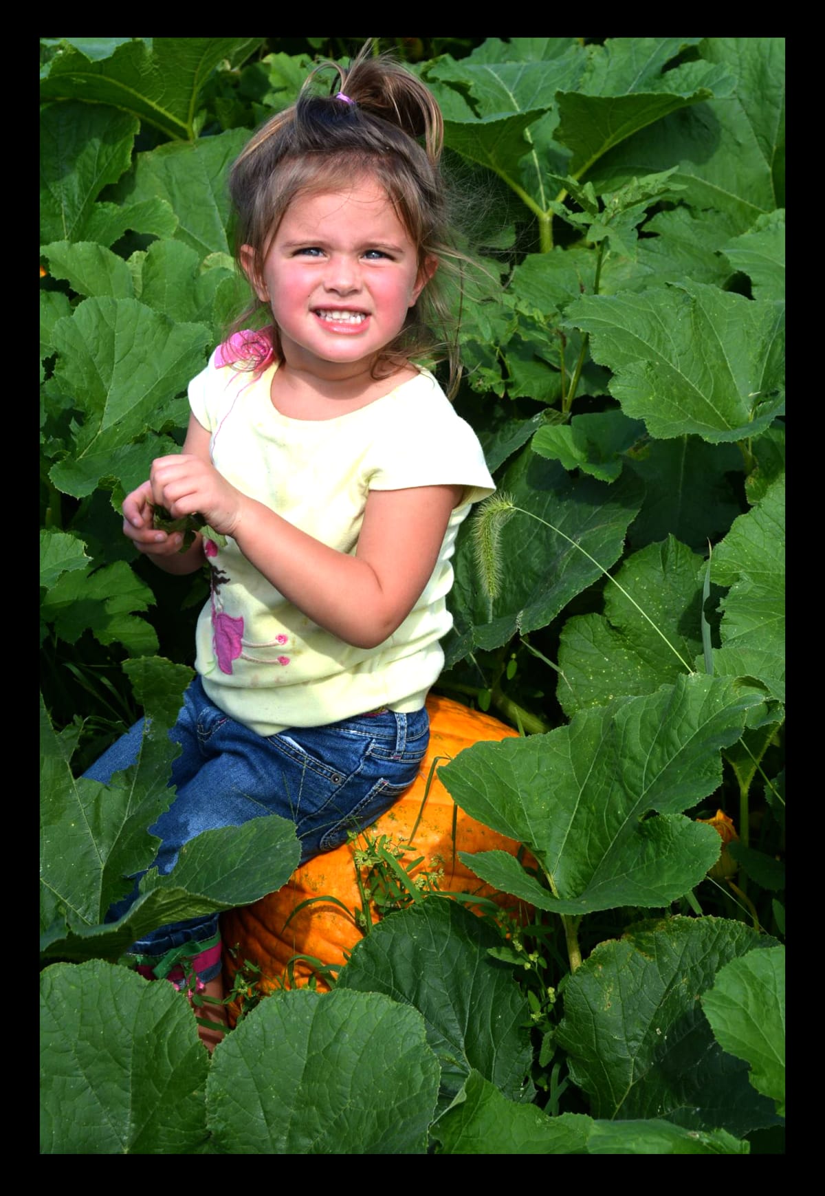 Girl on Pumpkin.png